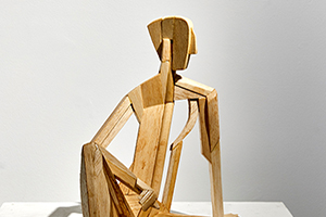 Seated Lad - wood